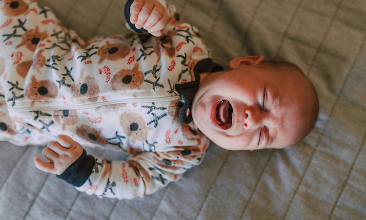 A baby crying in sleep